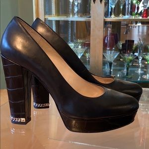 Black platform pump with embellished heel